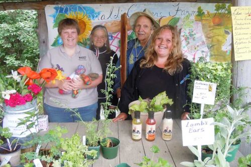 four of the 20 regular vendors at the McDonalds Corners Farmers’ Market, l-r Alanna Riff, Lynne Parks, George Fisher and Melany Blake